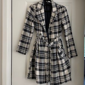 Black, white, and grey winter coat